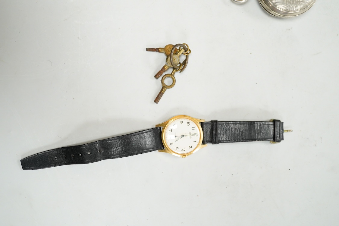 A George V silver cased goliath calendar moon phase open faced pocket watch, case diameter approx. 67mm(a.f.), together with five other pocket watches, including silver and white metal Waltham, a Camerer Cuss chrome case